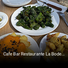 Reserve ahora una mesa en Cafe Bar Restaurante La Bodega