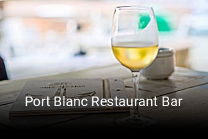 Reserve ahora una mesa en Port Blanc Restaurant Bar