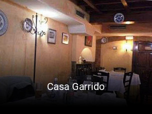 Reserve ahora una mesa en Casa Garrido