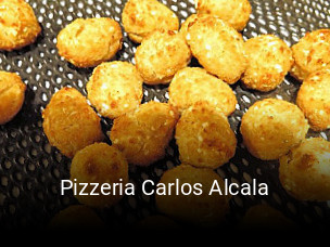 Reserve ahora una mesa en Pizzeria Carlos Alcala