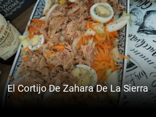Reserve ahora una mesa en El Cortijo De Zahara De La Sierra