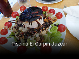 Reserve ahora una mesa en Piscina El Carpin Juzcar