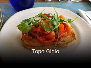 Reserve ahora una mesa en Topo Gigio