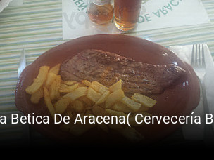 Reserve ahora una mesa en Pena Betica De Aracena( Cervecería Braseria Manolo El De La Peña)