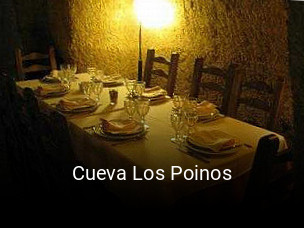 Reserve ahora una mesa en Cueva Los Poinos