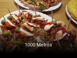 Reserve ahora una mesa en 1000 Metros