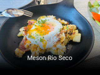 Reserve ahora una mesa en Meson Rio Seco