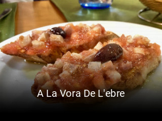 Reserve ahora una mesa en A La Vora De L'ebre