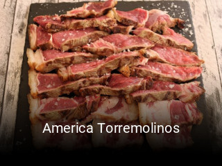 Reserve ahora una mesa en America Torremolinos