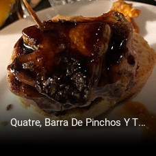 Reserve ahora una mesa en Quatre, Barra De Pinchos Y Tapas