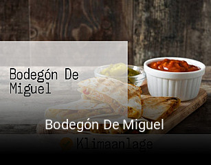Reserve ahora una mesa en Bodegón De Miguel