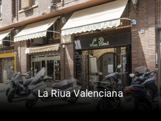 Reserve ahora una mesa en La Riua Valenciana