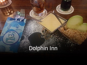 Reserve ahora una mesa en Dolphin Inn