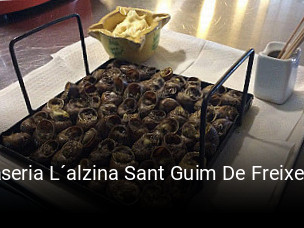 Reserve ahora una mesa en Braseria L´alzina Sant Guim De Freixenet