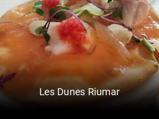 Reserve ahora una mesa en Les Dunes Riumar